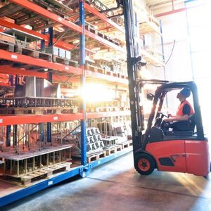 Forklift truck in a warehouse