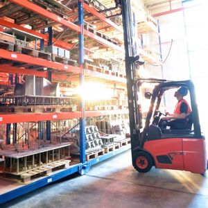 Forklift truck in a warehouse